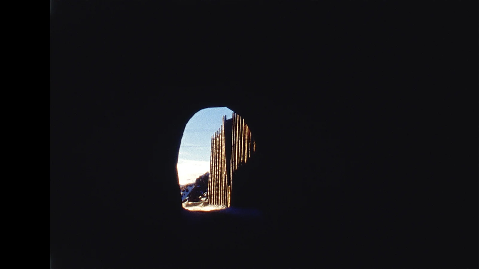 Between my flesh and the world's fingers