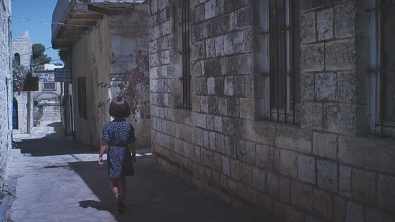 And the alley she whitewashed in light blue